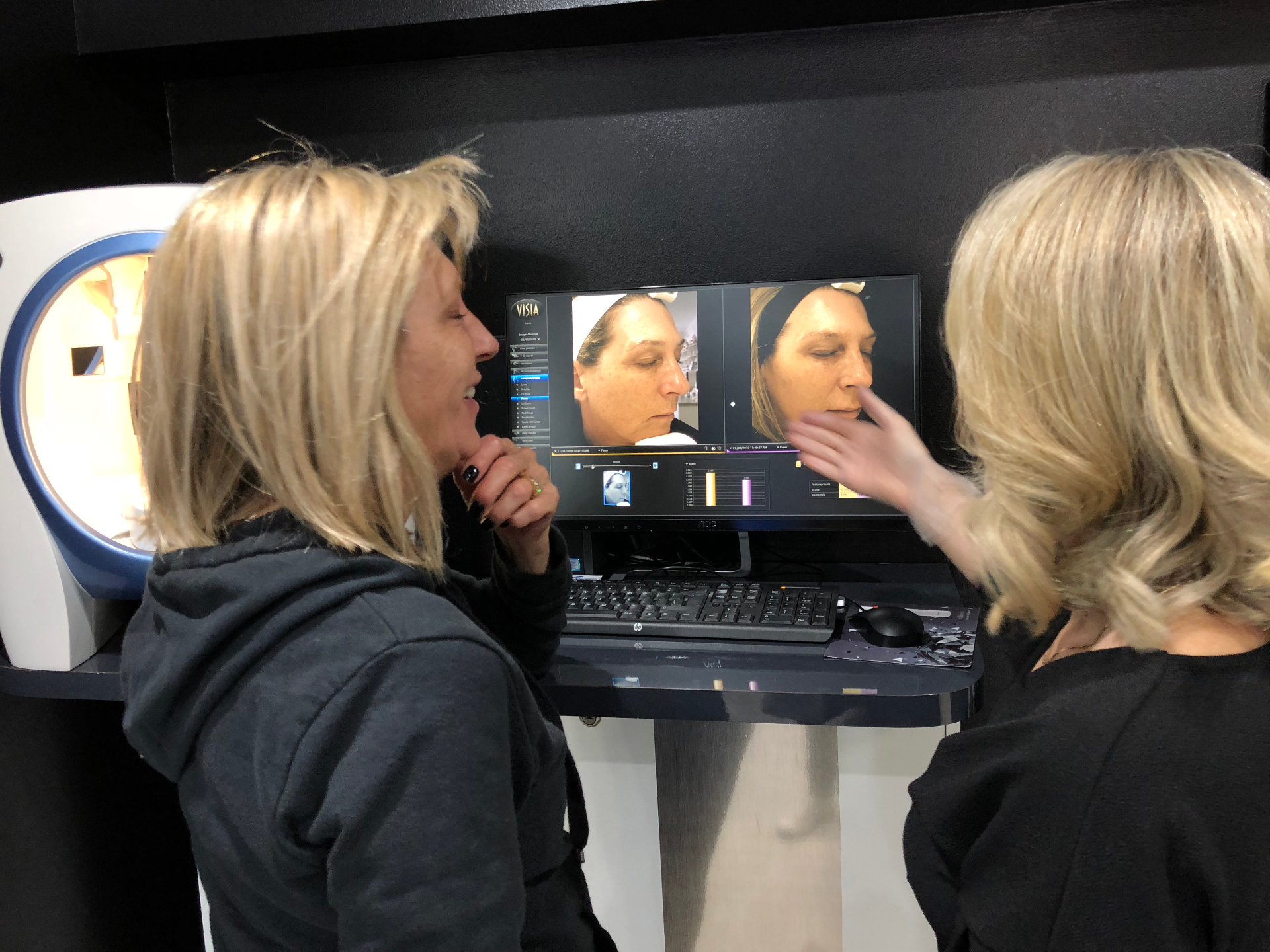 A dermal clinician performing an LED treatment